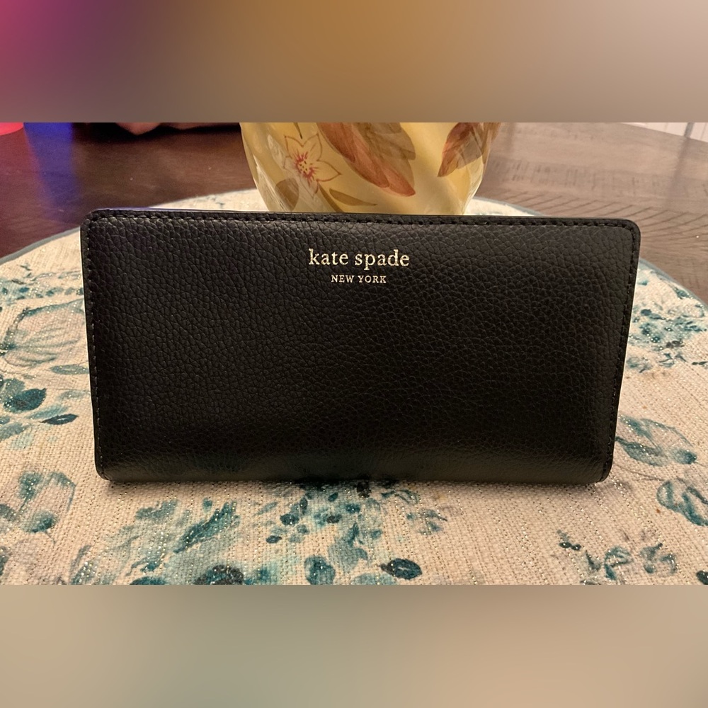 NWT MSRP $149 Kate Spade Large Eva Slim Bifold Black Wallet Tan Inside